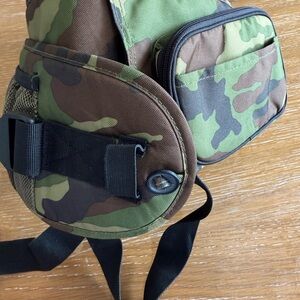 Camouflage TushBaby hip carrier